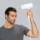 Braun HD210SDE Model Drying his Hair